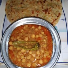 Chickpeas Gravy with Paratha A picture of Chickpeas Gravy with Paratha.
