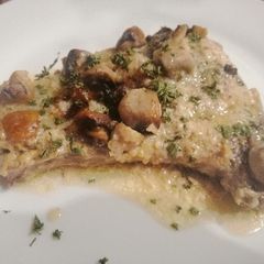 A picture of Mushroom pork chops.