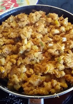 A picture of Extremaduran Migas with Fried Chorizo, Fried Potatoes, and Fried Pork Belly.