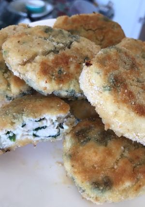Una foto de Nuggets/patitas de pollo y espinaca