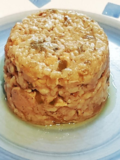 Una foto de Arroz cremoso con pollo al curry y leche de coco