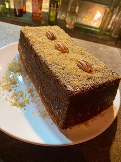 A picture of Banana Bread with Walnuts.