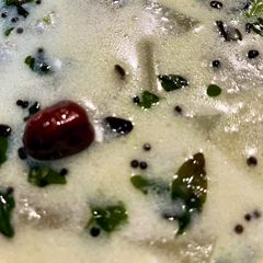 A picture of Poosanikkai Mor Kootu (Ash gourd Mor Curry).