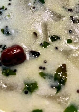 A picture of Poosanikkai Mor Kootu (Ash gourd Mor Curry).