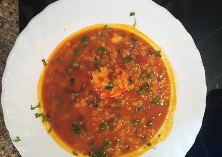 Arroz caldoso con carabineros y tigres, para 4