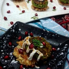 A picture of Lucknowi matar chaat in rosti disc.