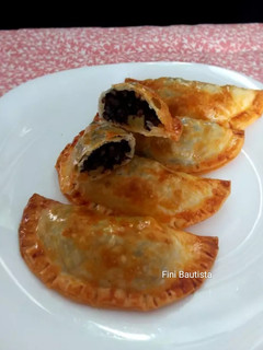 Una foto de Empanadillas de morcilla de arroz y manzana