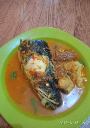 Foto resep Ikan toman masak kuning sederhana super enak