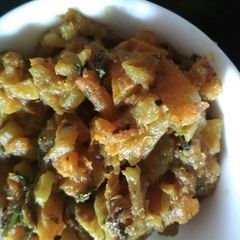 A picture of Lau ghonto (bottle gourd curry).