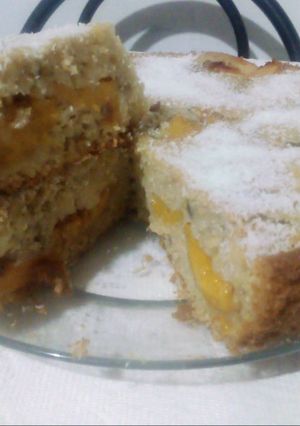 Una foto de Torta escondida de duraznos 🍑