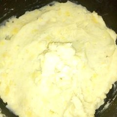 A picture of Boiled potatoes and banana.