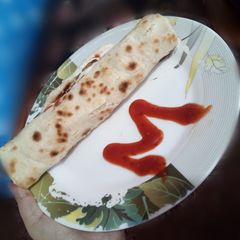 A picture of Chicken filled Roti Roll.