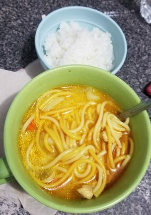 A picture of Homemade Chicken Soup and White Rice.
