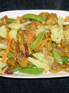 Una foto de POLLO SALTEADO AL CURRY. JON STYLE