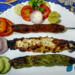 A picture of Tiranga Chicken Seekh Kebabs.