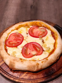 Una foto de Pizza de masa madre