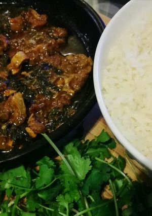 A picture of Lamb and spinach curry.