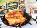 Ethapazham Nirachathu / Malabar Style Stuffed Plantain Fritters With Sweet Coconut Filling