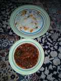 Rice nd stew with spring onions inside the stew