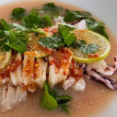 A picture of Steam Squid with Spicy chili Lime Sauce.