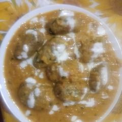 A picture of Mix veg cabbage dumpling curry.