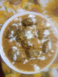 A picture of Mix veg cabbage dumpling curry.