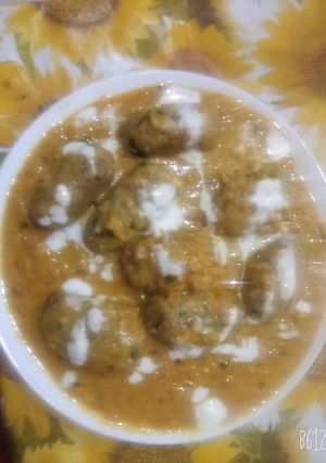 A picture of Mix veg cabbage dumpling curry.