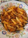 Macarrones con berenjena y queso parmigiano