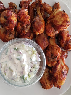 A picture of Cucumber Yogurt & Chicken Drumsticks in Spices.