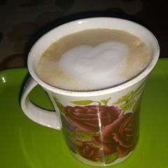 A picture of Hand made expresso hot coffee.