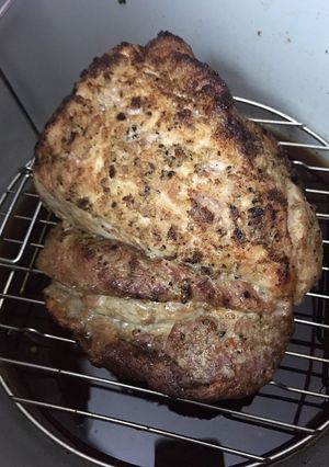 A picture of Pork loinIn a pressure cooker.