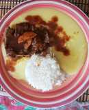 Asado con puré y arroz