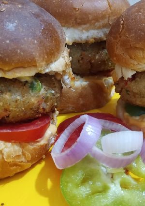 A picture of Crispy Veg Tikki Burger Recipe/VegTikki Cheese Burger.