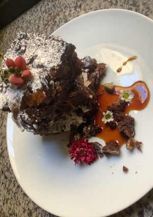 Une photo de Brownie chocolat 🍫 noix de pécan 🍁🌰pistaches 🍰