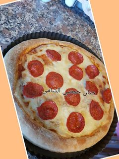 صورة لوصفة عجينة دومينوز بيتزا