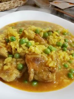 Una foto de Arroz caldoso con Costillas, Morcilla y Guisantes