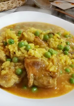 Una foto de Arroz caldoso con Costillas, Morcilla y Guisantes
