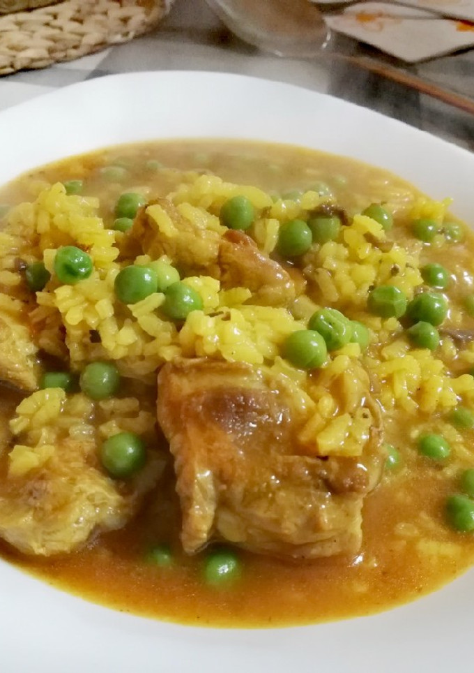 Una foto de Arroz caldoso con Costillas, Morcilla y Guisantes