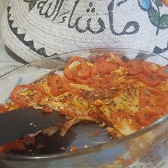 A picture of Tomatoes and herbs lasanya bake.