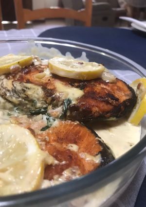 A picture of Pan fried Salmon with creamy sauce.
