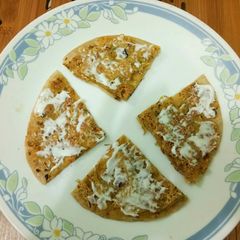A picture of Besan and wheat Roti.