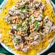 A picture of Mansaf (lamb with rice and yogurt sauce) (Jordan).