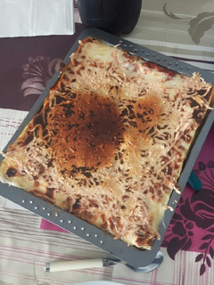 Una foto de Lasaña súper gratinada