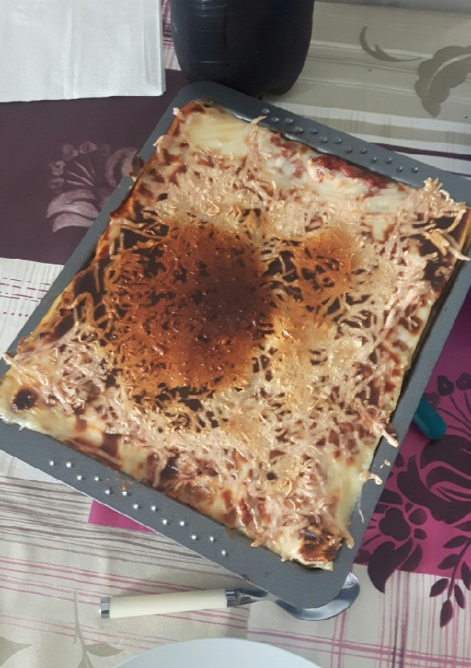 Una foto de Lasaña súper gratinada