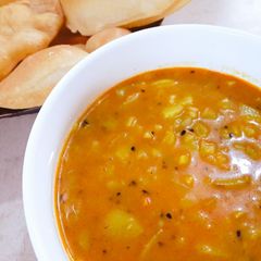 A picture of Aloo Tarkari with Puri.