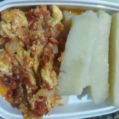 A picture of Boiled yam and egg sauce.