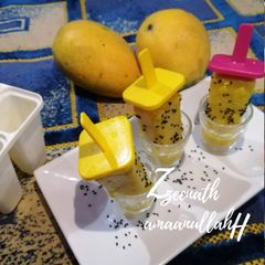A picture of Aamras Popsicles with Chia.