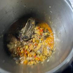 A picture of Wild rabbit in pressure cooker.