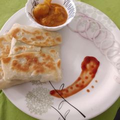 A picture of Moghlai paratha shallow fry.