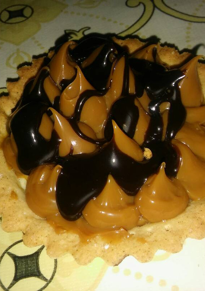Una foto de Tarteletas copitos de dulce de leche